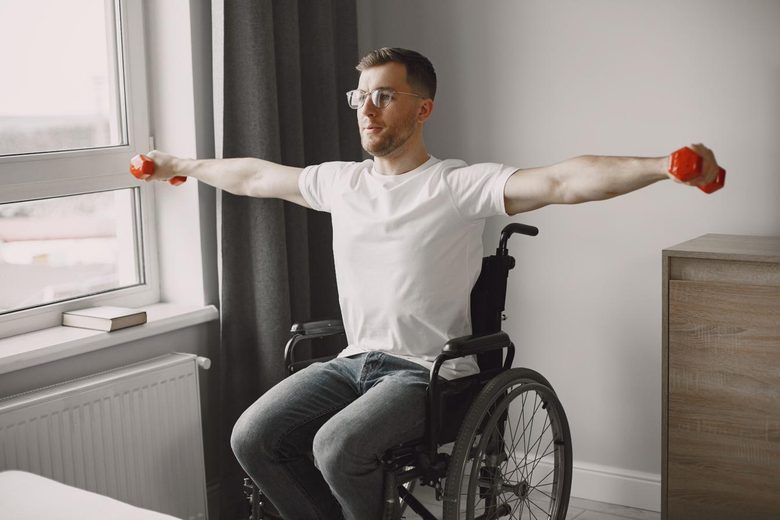 Physiotherapist providing a home visit to a patient