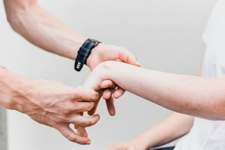 Physiotherapist treating patient with professional care
