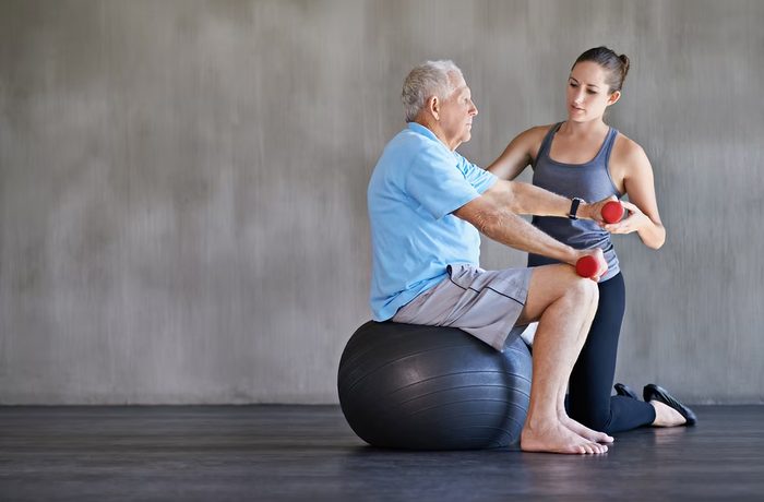 Physiotherapist treating a patient